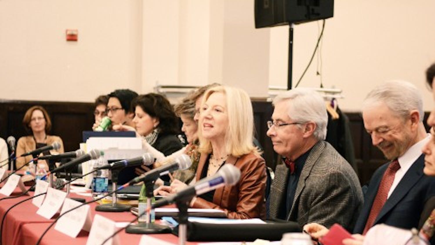 Penn President Amy Gutmann, center, spoke at a University Council meeting last year during which she introduced the Task Force on Student Psychological Health and Welfare.