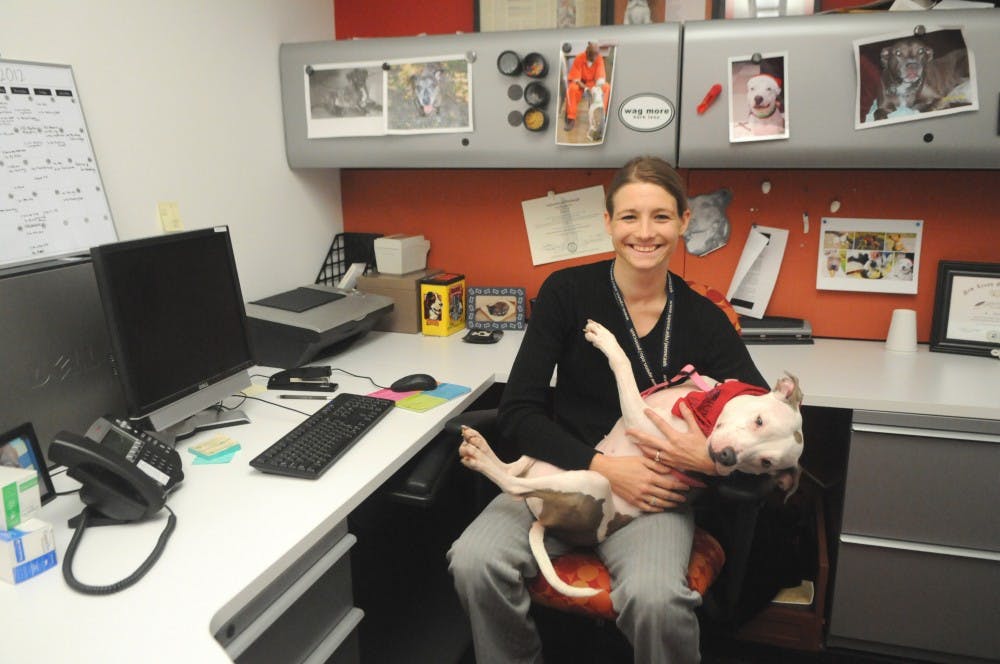 Michele Pich is a pet loss grief counselor at Penn Vet, with her dog Vivian