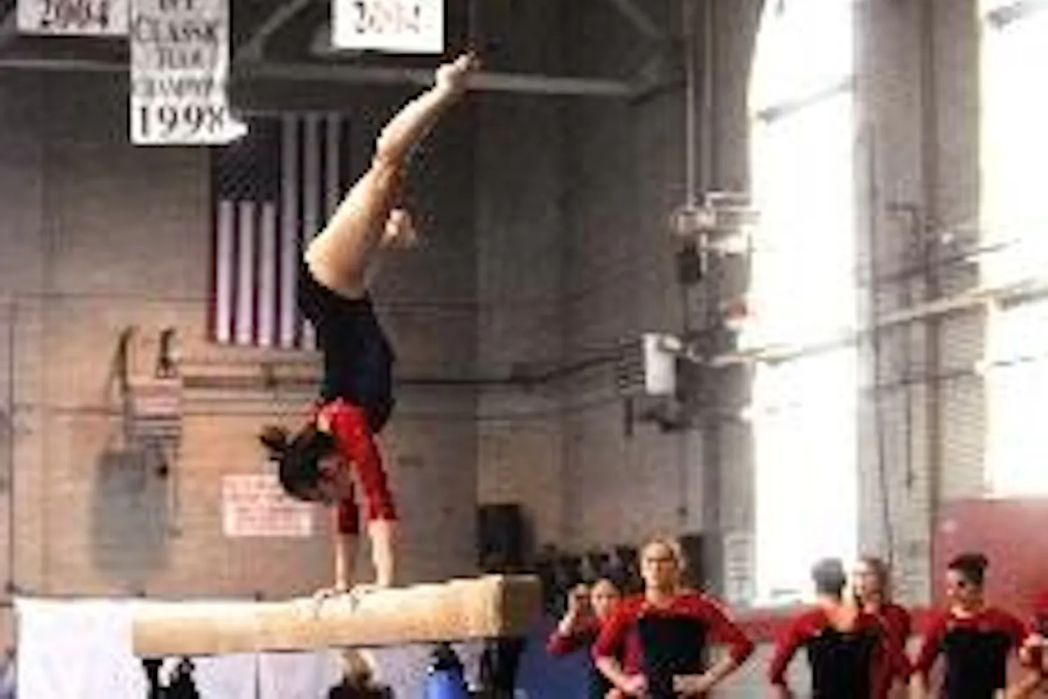 Towson foils Gymnastics again