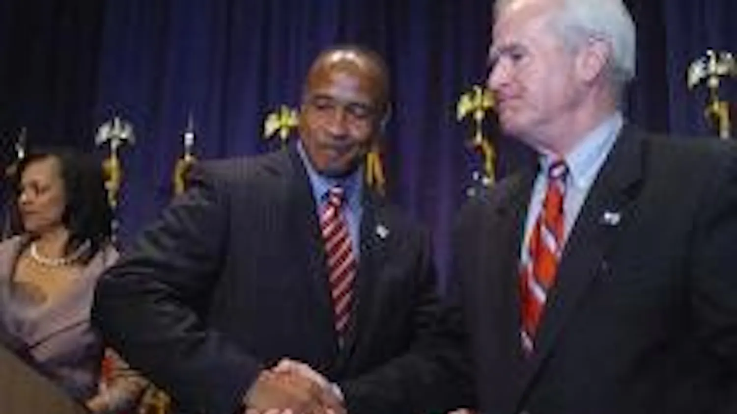 Swann concedes, saying he is 'not accustomed to losing'