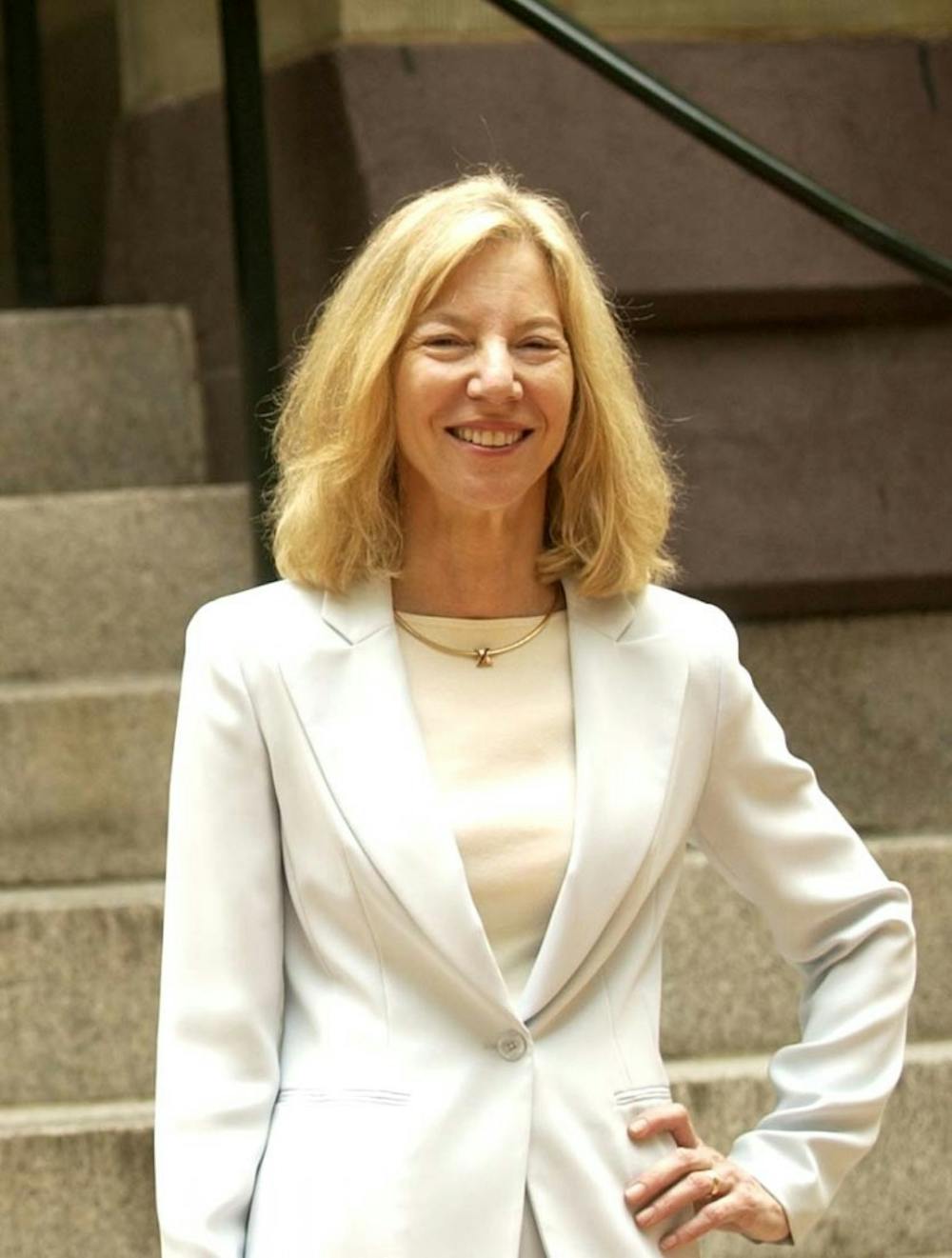 New Penn President Amy gutmann on her first day in office outside college hall