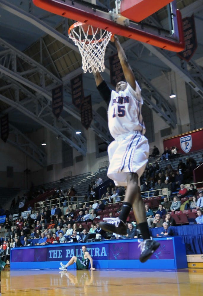 	Camryn Crocker misses a dunk early in the first half for Penn, which lost, 69-64, to Dartmouth on Friday night at the Palestra.