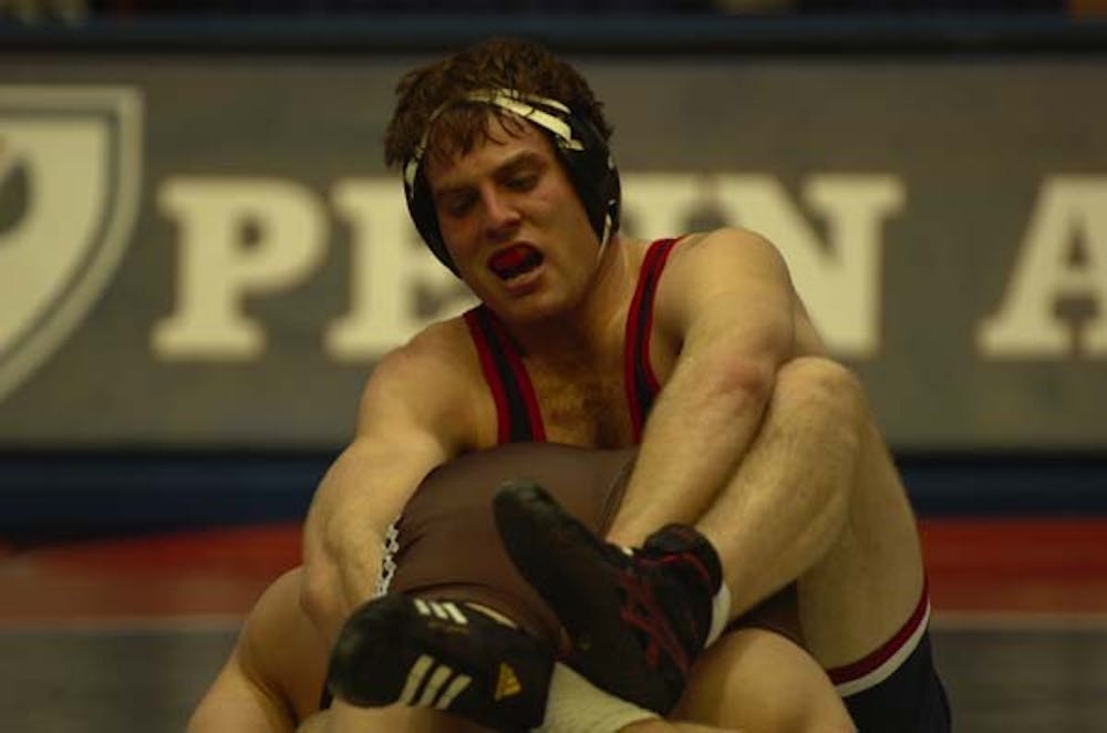 Wrestling beats two local rivals