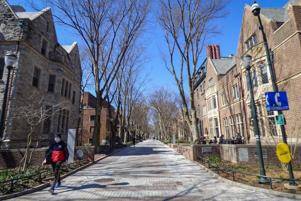 03-14-21-locust-walk-spring-winter-campus-covid-19-masks-ezra-troy