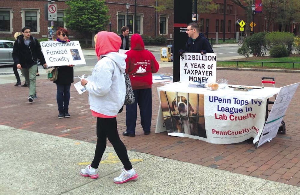 	Members of Animal ACTivists of Philly rally at the corner of 34th and Walnut streets against abuses of animals in University research facilities. In 2011, a study reported that Penn had committed 11 “severe violations” to animal welfare.