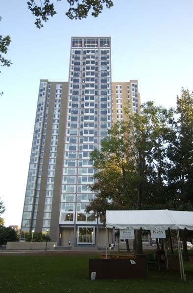 Richard Kopp helps his fellow Restaurant School student Arli White register to vote on a Locust Walk bench.  Elliot Leonard provided the forms and encouragement as part of the V.I.P. get-out-the-vote program.