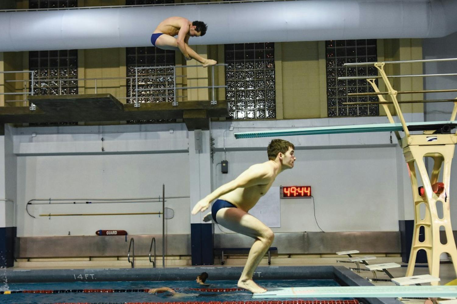 Freshmen divers Andrew Bologna (top) and Trent Hagenbuch (bottom) are the only two members of Penn men’s diving and will look to gain experience while challenging one another when performing this season.