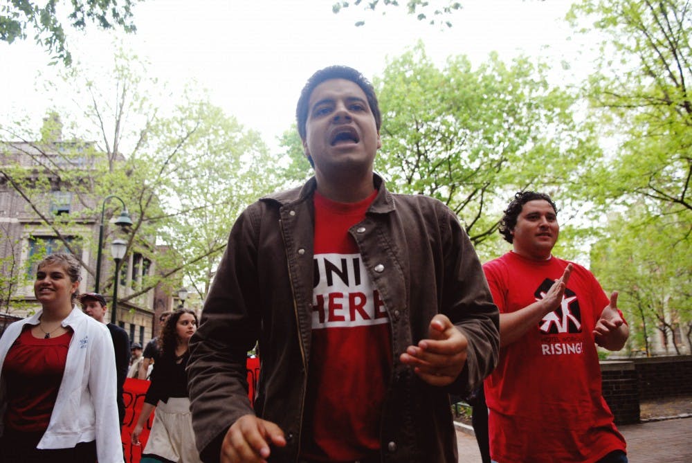 Members of the Student Labor Action Project, also known as SLAP, marched from the Franklin Building to Steinberg-Dietrich to drop off a letter protesting Wharton's refusal to boycott HEI hotels, which allegedly mistreats its workers.