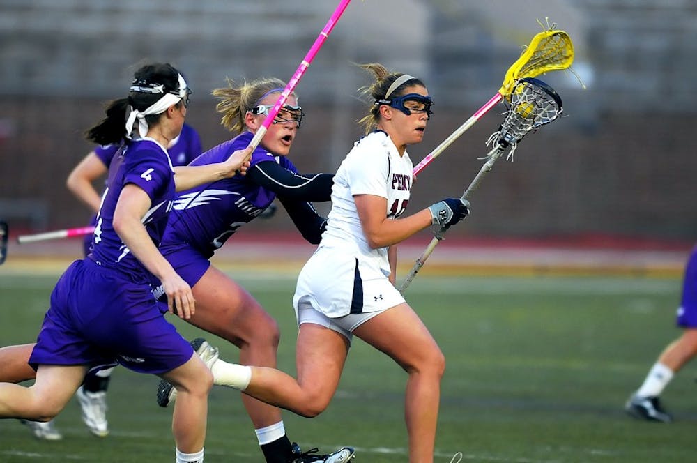 No. 1 Wildcats elude Quakers
