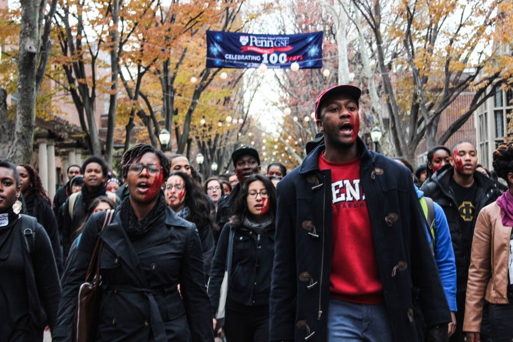 Students gathered on Penn's campus to join the citywide march following the announcement that officer Darren Wilson was not indicted for killing 18-year-old Michael Brown in Ferguson, Mo. | DP File Photo