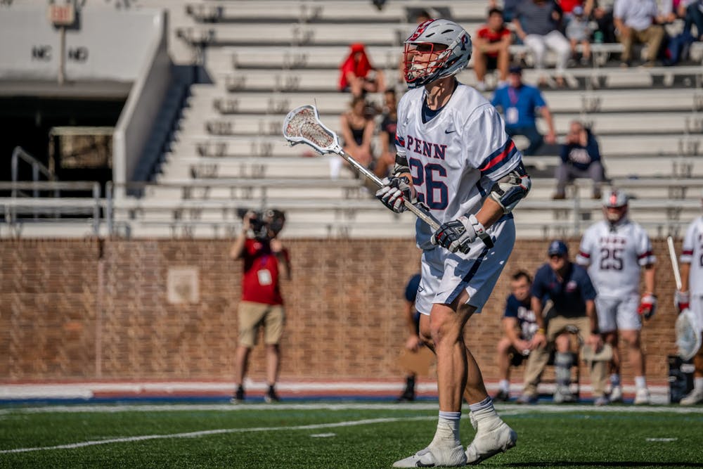 04-16-22-mens-lacrosse-vs-harvard-sam-handley-borna-saeednia-00