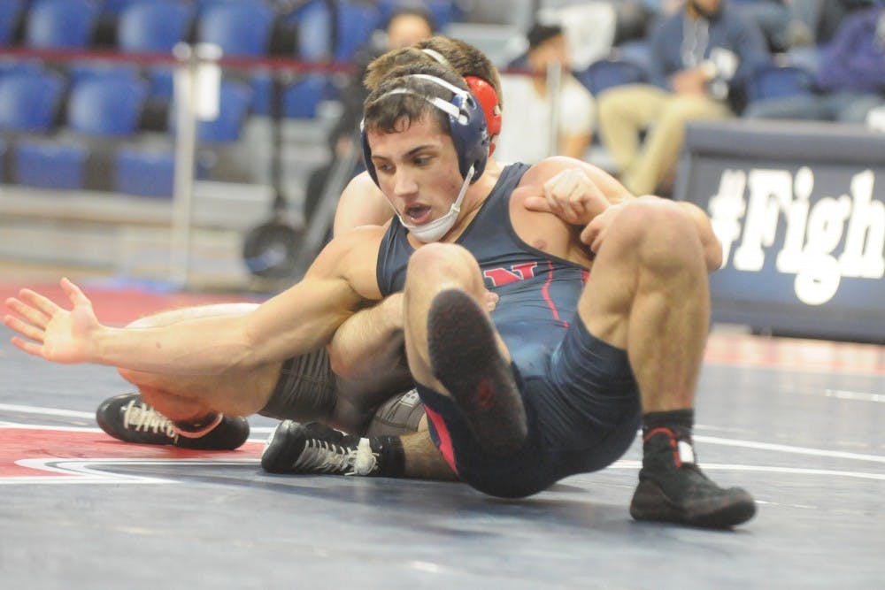 Senior Jeff Canfora was one of several Red and Blue grapplers to win on Saturday, notching a 9-1 major decision against Columbia.