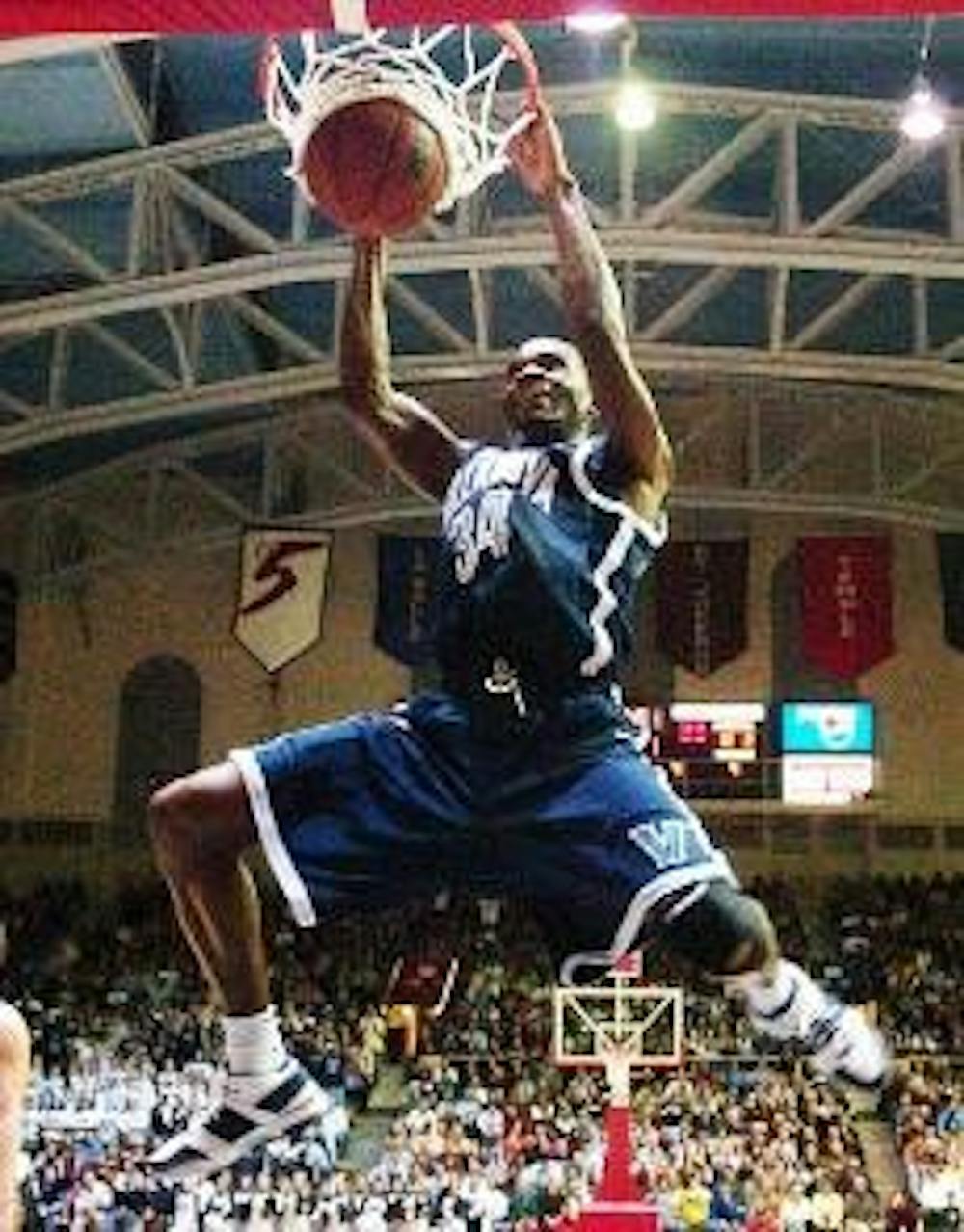 'Cats claw past Quakers