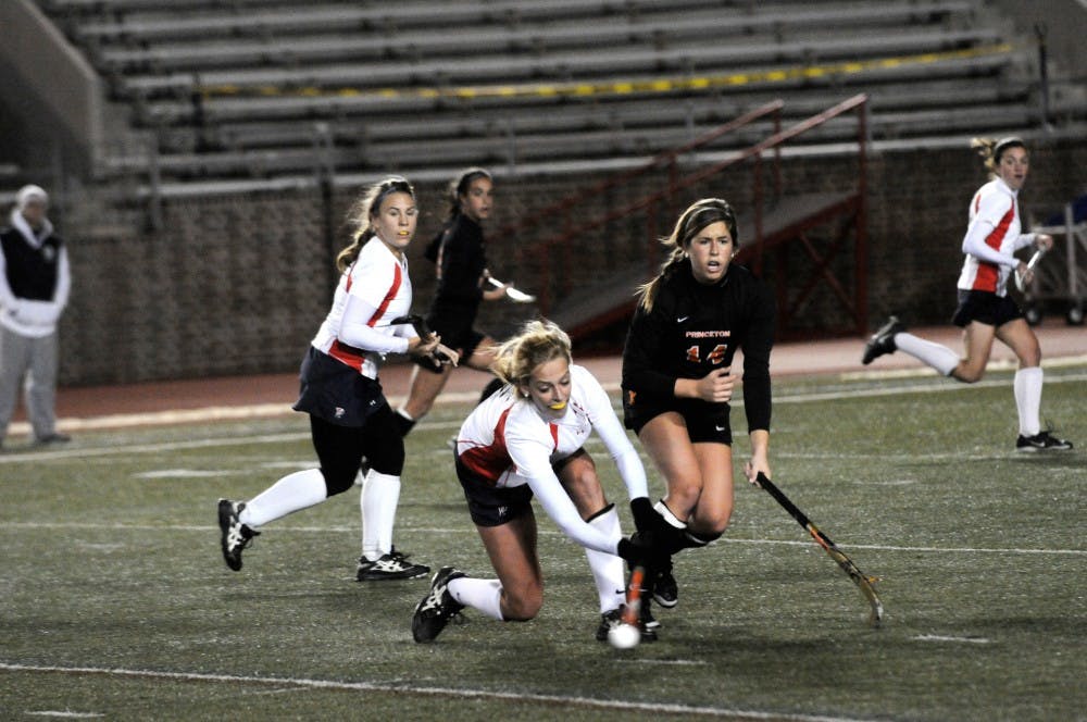 Penn's field hockey team suffered a brutal 6-0 shutout by the Princeton Tigers on Friday. (14) Katie Reinprecht, (2) Rose