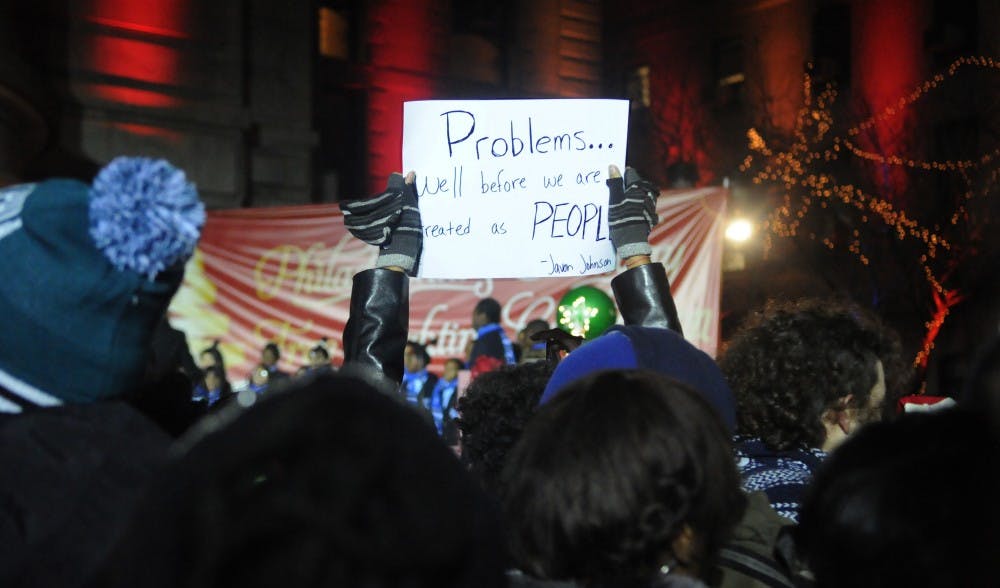 Protestors held a die-in protest inside 30th Street Station before marching to CIty Hall in protest of the Ferguson decision