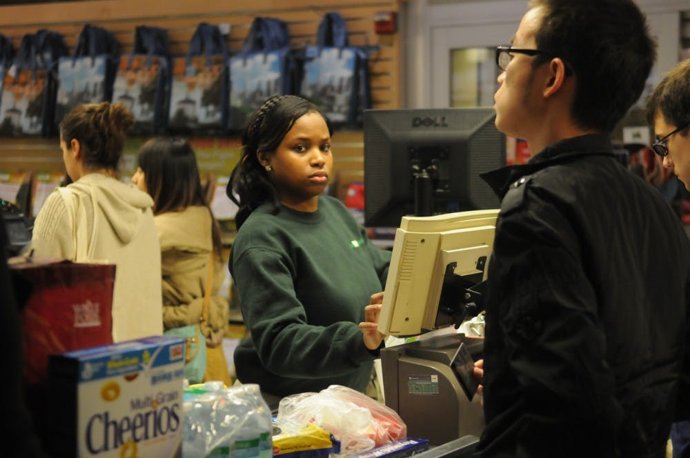 Students pack Fresh grocer in preparation for Hurricane Sandy