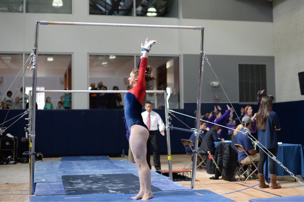 Sophomore Olivia Neistat is a specialist on the bars, but when she's not doing her routine, she's doing the mid-match tweets for Penn Gymnastics. 