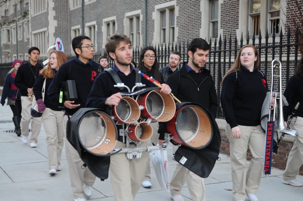 Members of the Penn Band head back after the Cornell game.