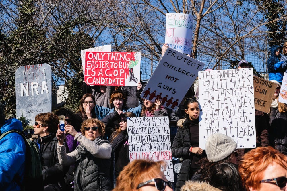 The most powerful signs from Philadelphia's March for Our Lives The