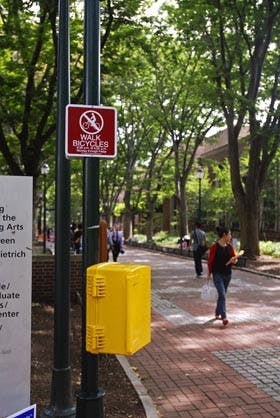 Bikes, cars and pedestrians share the road