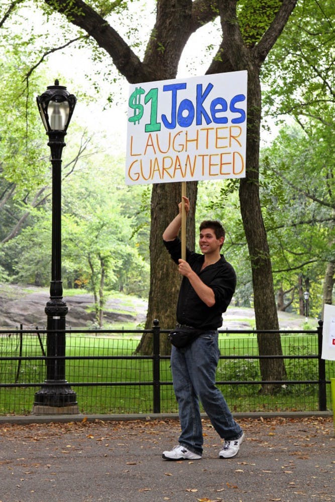 Jason Schneider tells jokes in Central Park