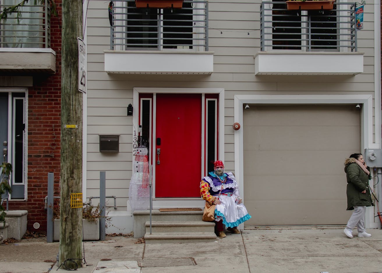 Mummers New Years 2021 Protest Lonely Mummer on Stairs.jpg