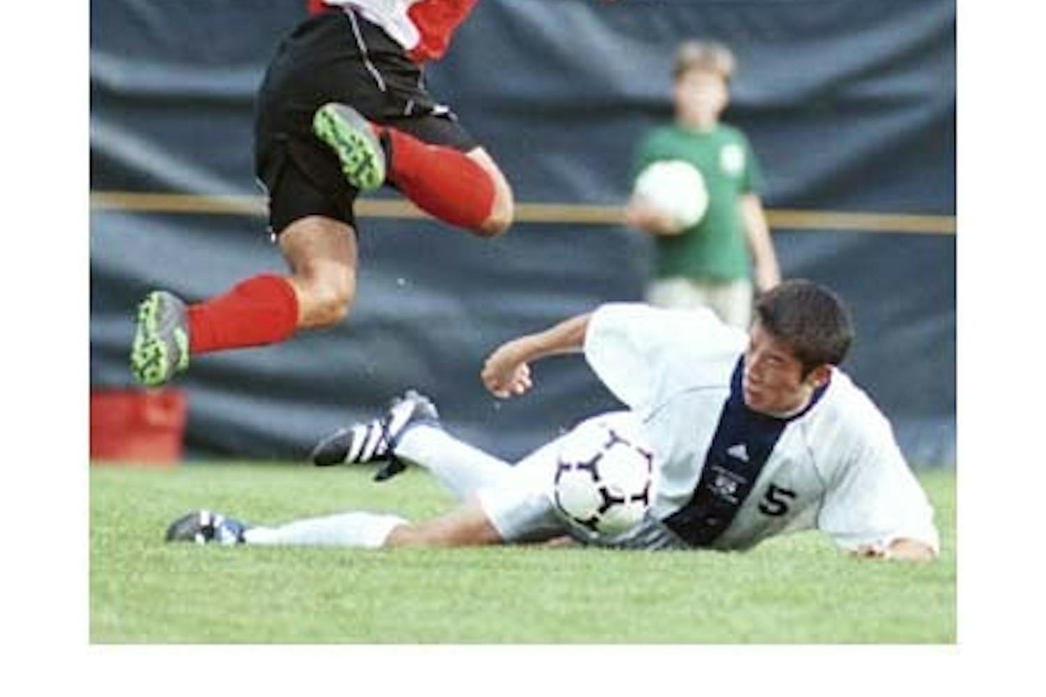 M. Soccer triumphant in opener