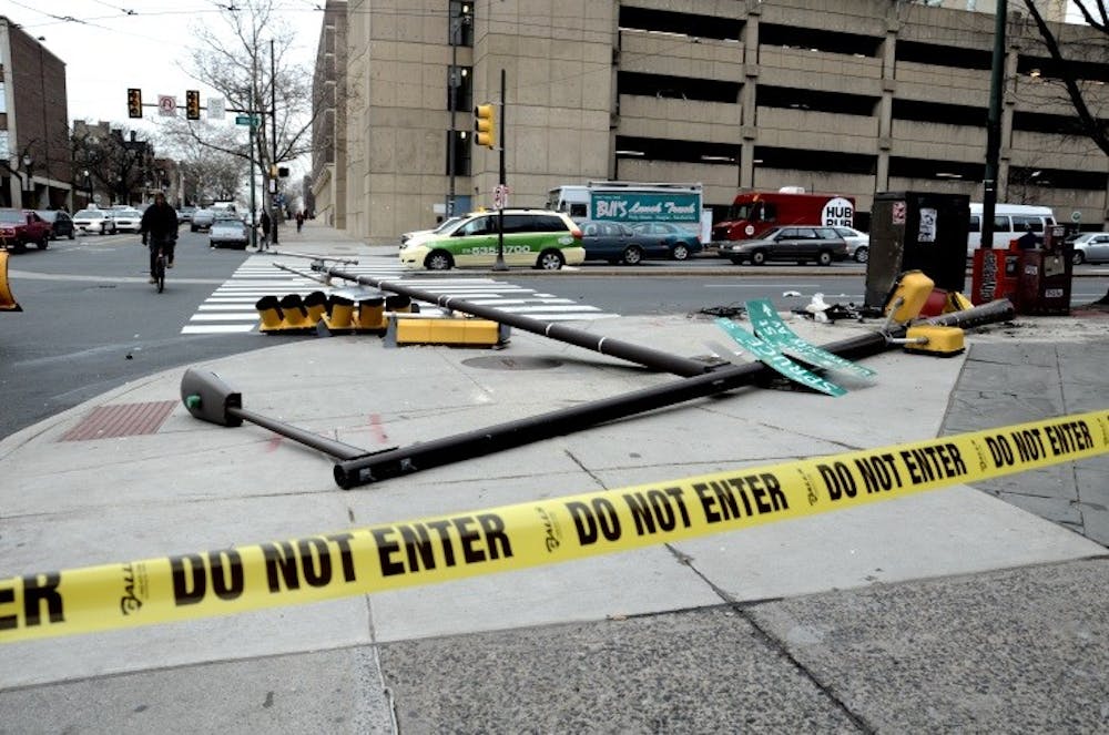 	A car knocked down a street pole around the intersection of 38th and Spruce Friday afternoon. 