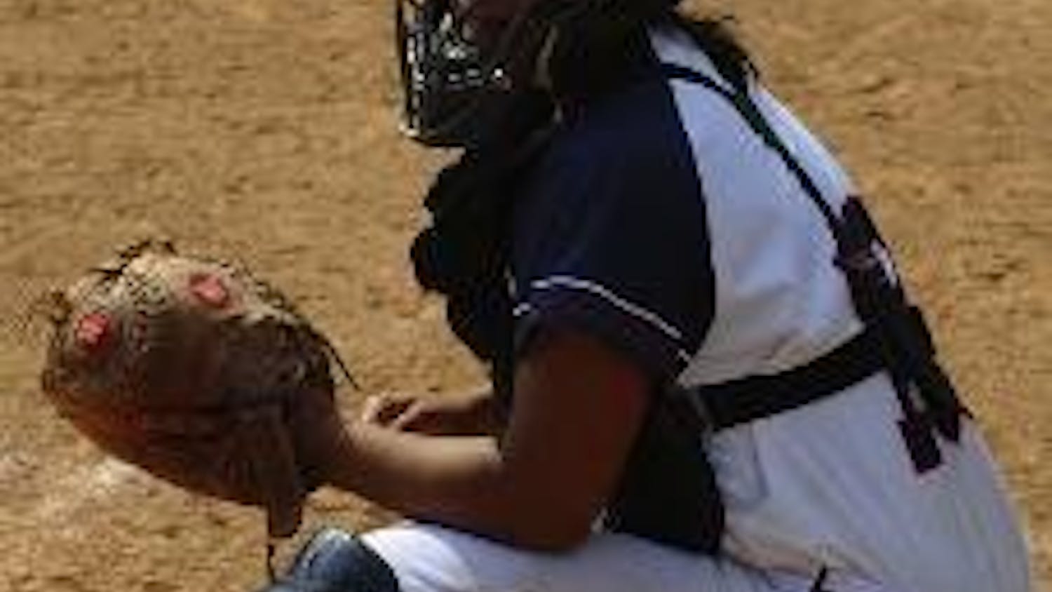 Softball's offense explodes to earn split