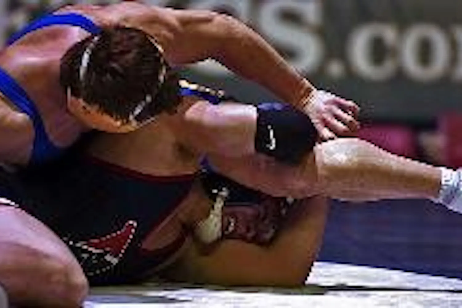 Wrestling | Alton towers over Quakers