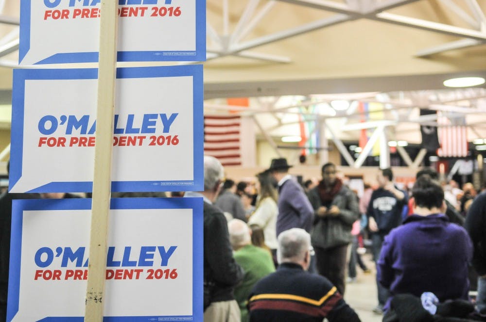 Signs for the O'Malley section at a Democratic Caucus in Clive, Iowa