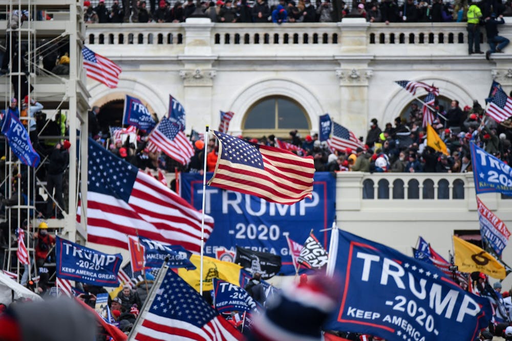 trump-protest-riot-capitol-washington-dc-american-flag