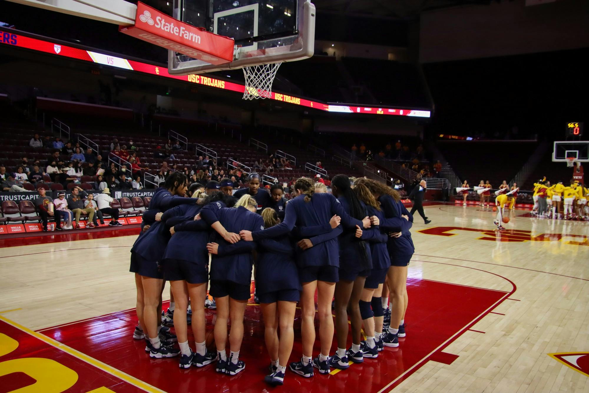 11-23-22 Women's Basketball vs USC Team Huddle (Garrett Button).jpeg