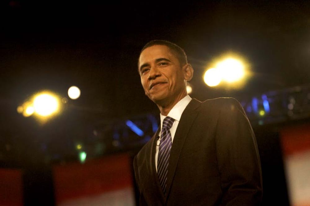The Democratic Debate at Drexel. Senator Barack Obama walks onto the stage.