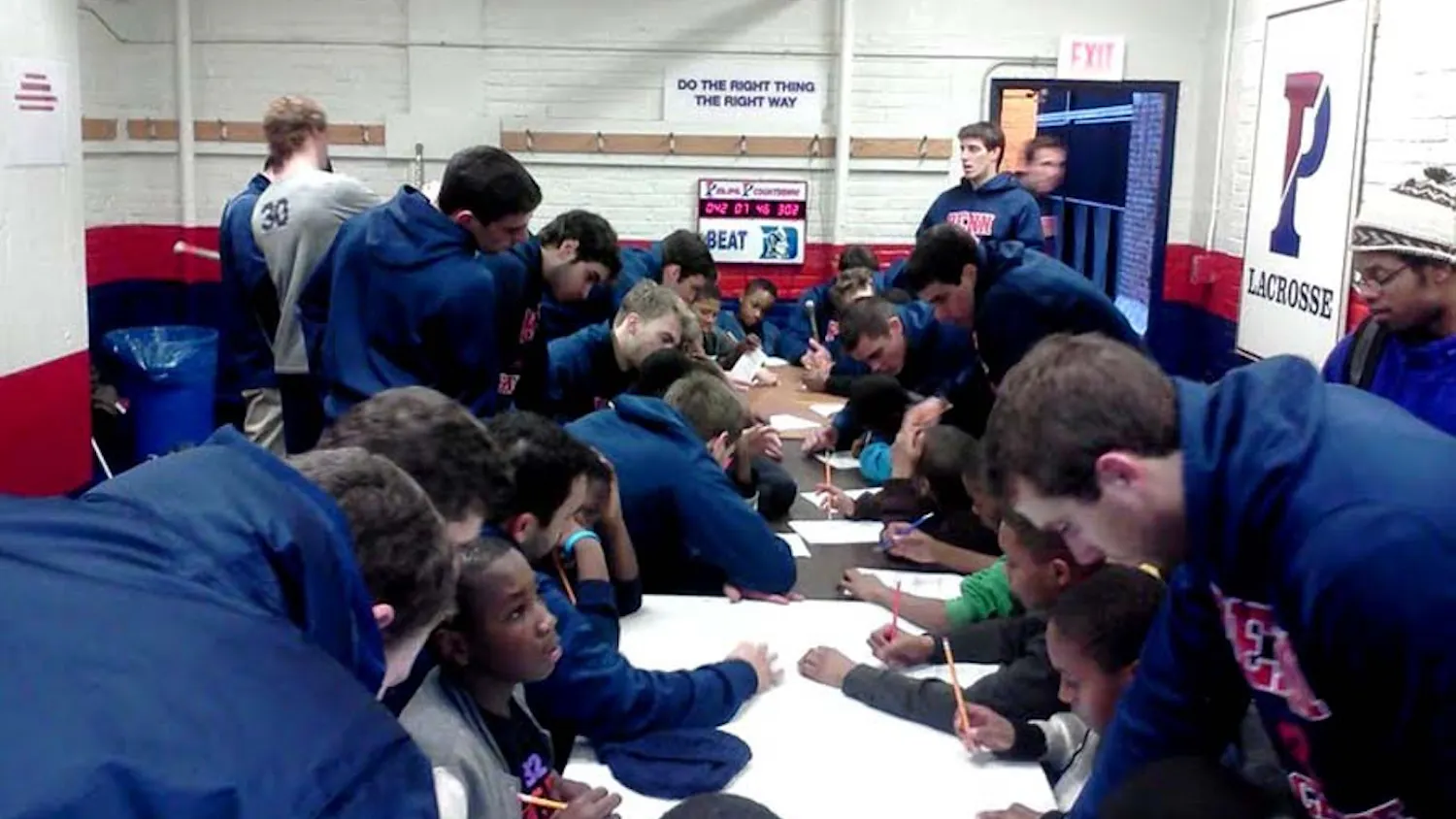 The Penn men’s lacrosse team meets once per week with students at Comegys Community School to tutor and run lacrosse practice.