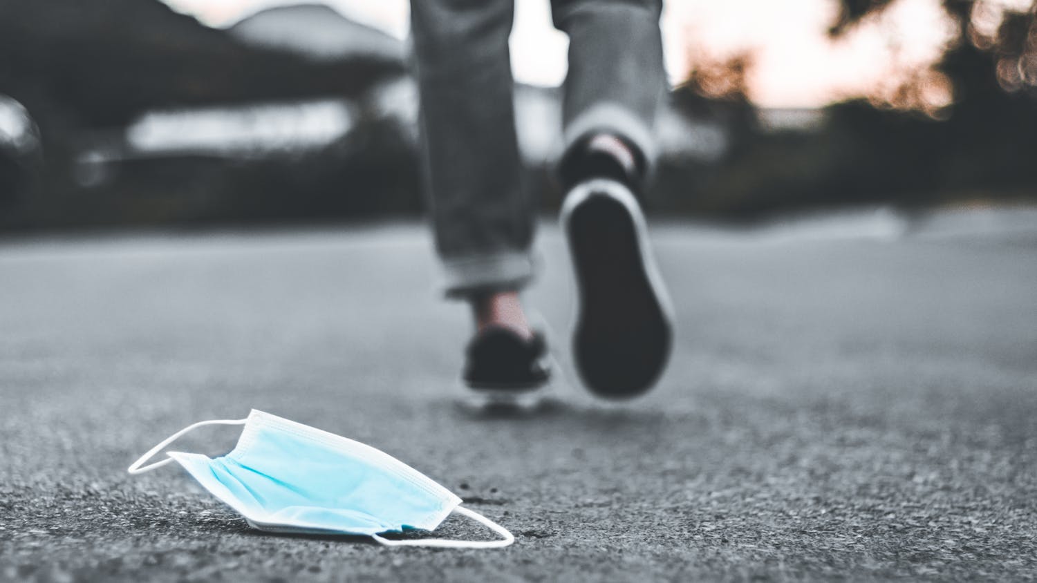 walking away from covid mask photo illustration (Diego Cardenas).png