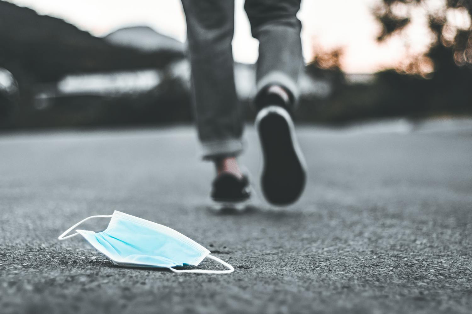 walking away from covid mask photo illustration (Diego Cardenas).png