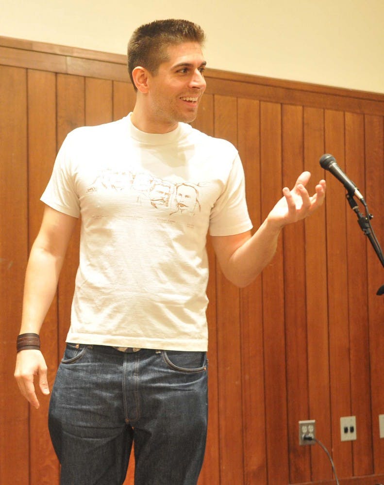 Poet, actor, and author Carlos Andres Gomez delivers PENNsando en Salud's keynote speech.