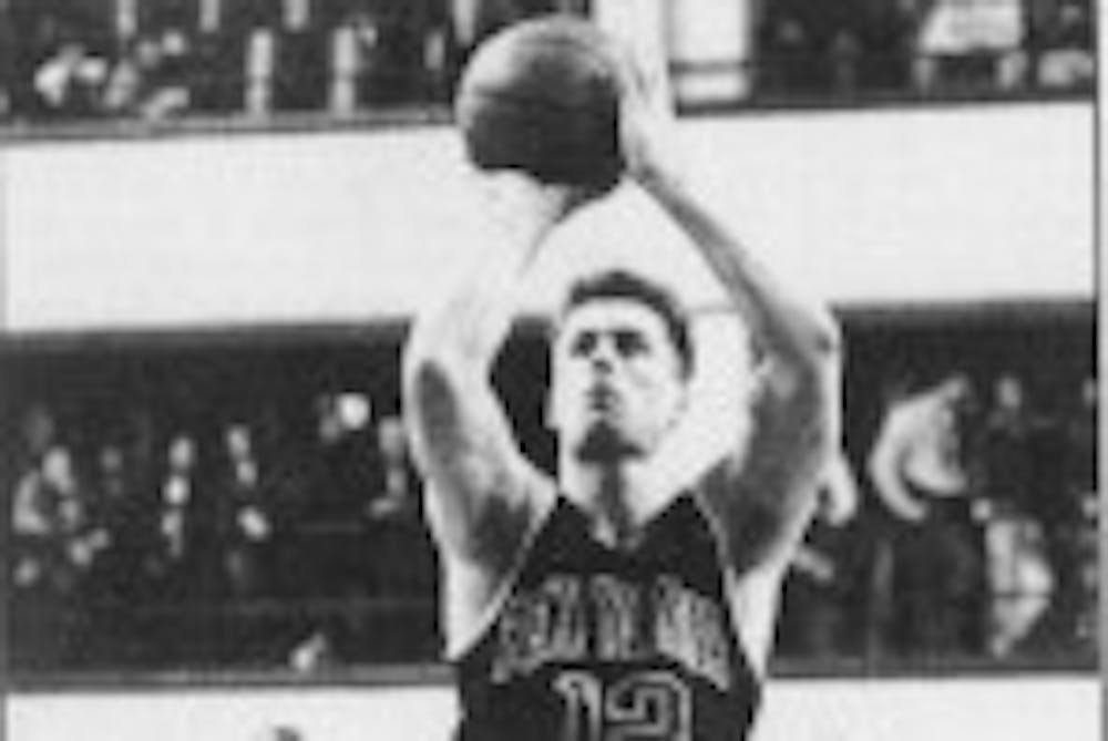 3-1-95-mens-basketball-matt-maloney-dp-archives