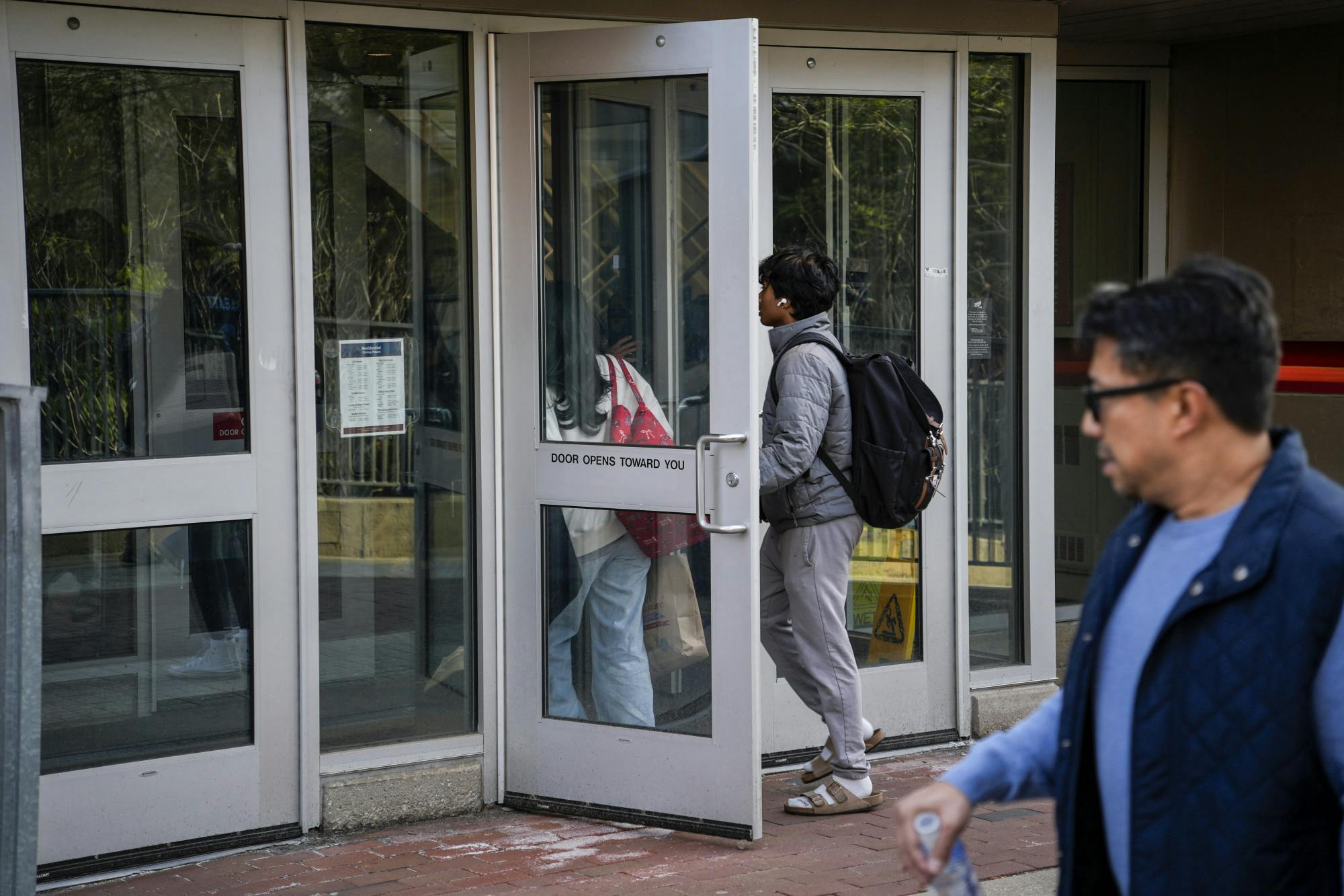 04-13-25 Student Holding Door (Grace Chen).JPG