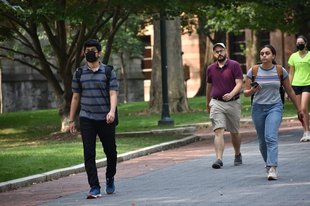 09-14-21-locust-walk-students-mask-no-mask-covid-samantha-turner