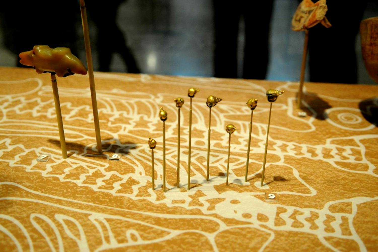 Beads of gold from a necklace were uncovered at the excavation site.