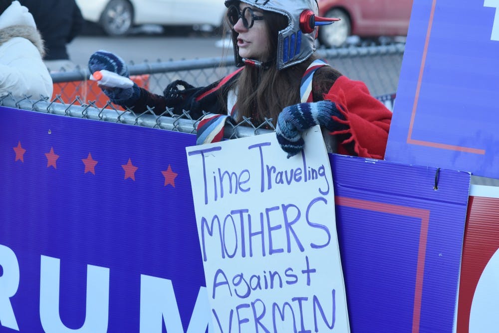 Some of Vermin Supreme's supporters sported unique outfits and signs.