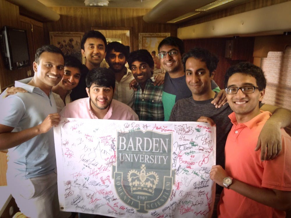 Members of Penn Masala were given an autographed Barden University banner after filming on set with the cast of Pitch Perfect 2.