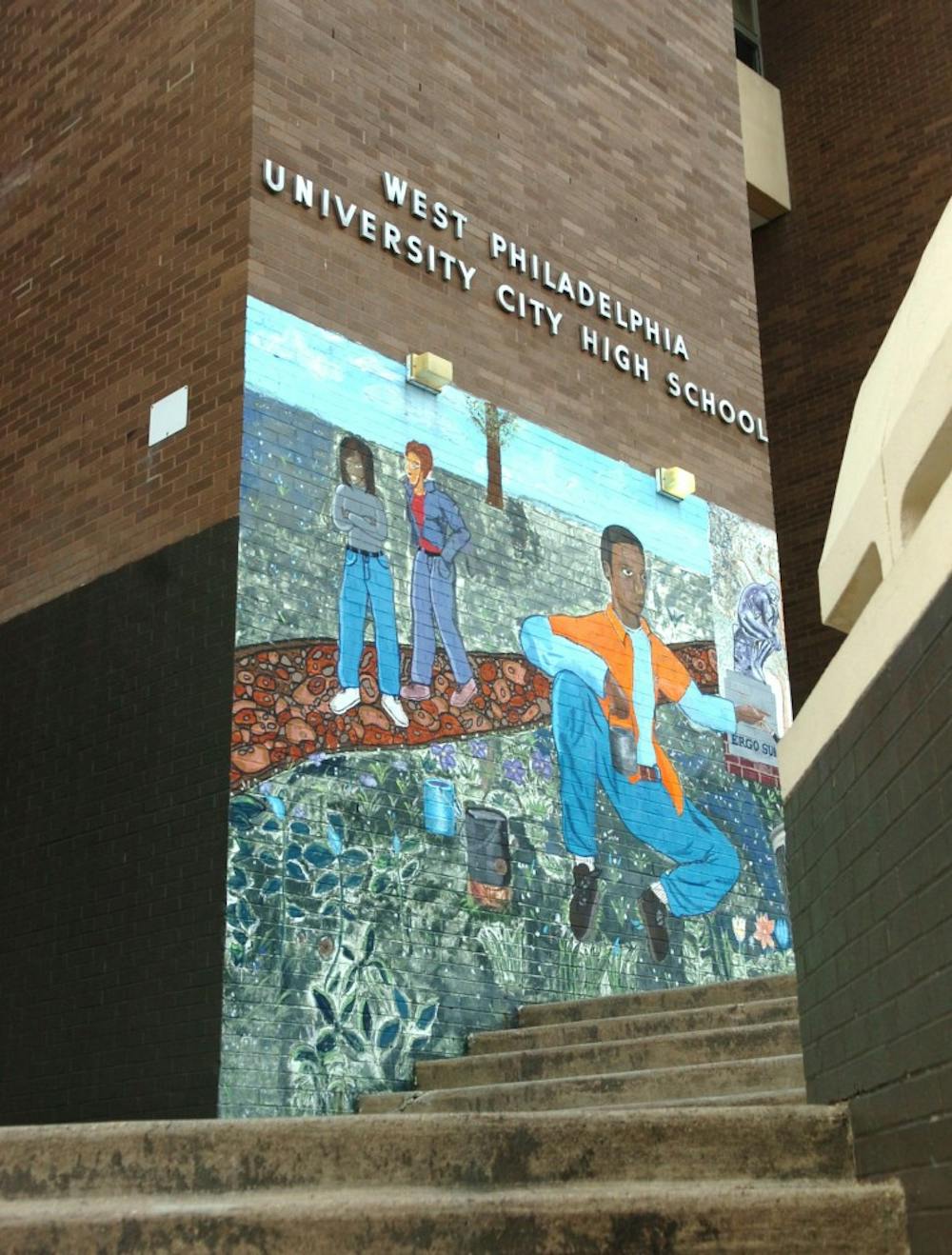 Murals outside University City High School, located at 36th and Filbert streets, illustrate the school's close relationship with the community.