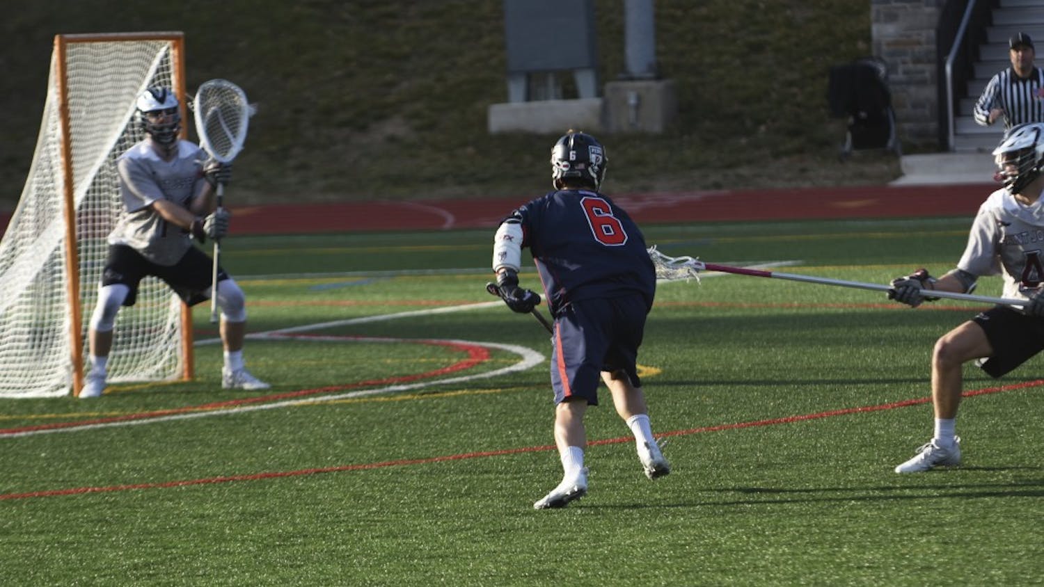 With the help of sophomore goalie Reed Junkin and his staggering 16 saves, Penn men's lacrosse kept No. 6 Virginia's comeback efforts at bay in an unbelievable 11-10 upset win.