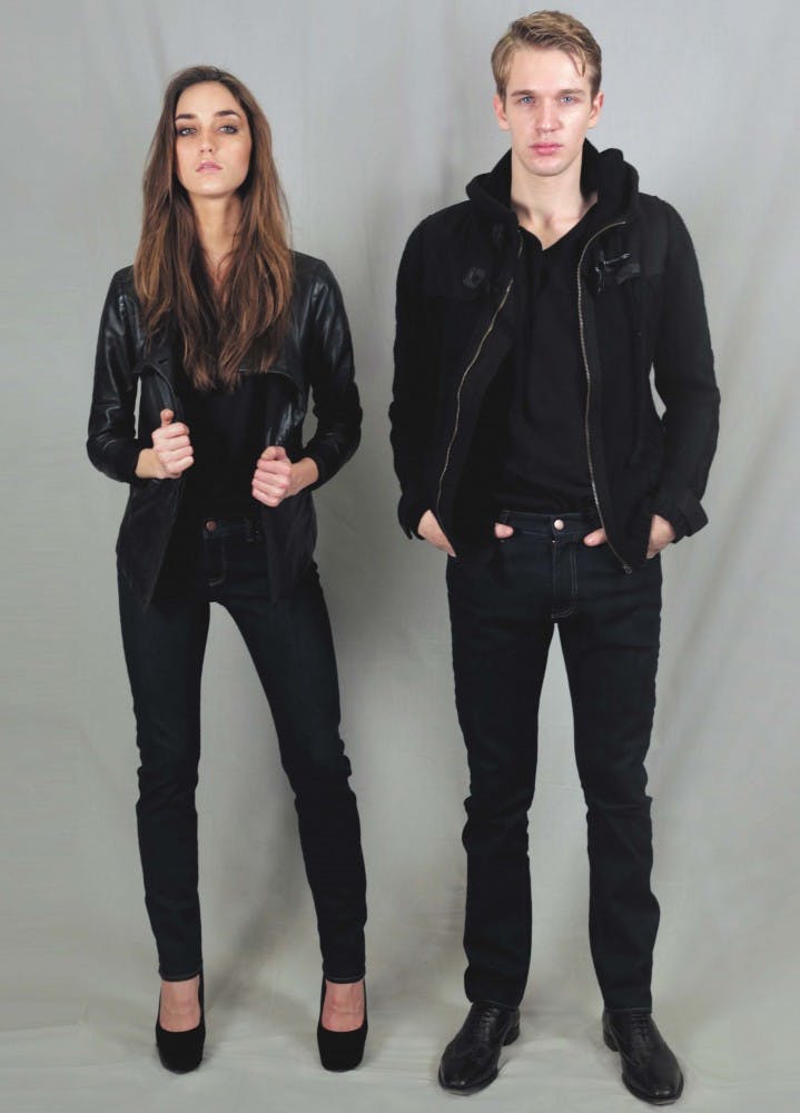 	Two models try on pairs of jeans by Parke New York, a brand founded by 2010 Wharton MBA graduate Solomon Liou which will launch this summer.