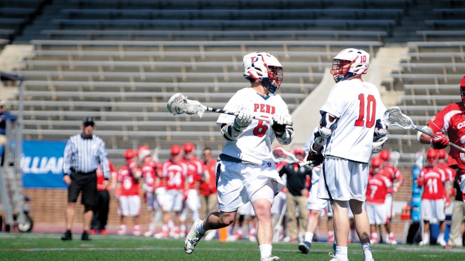 A hat trick from freshman Alex Roesner (6) helped Penn men's lacrosse take a 6-0 lead over Cornell on Sunday as the Quakers held off the Big Red, 9-6.