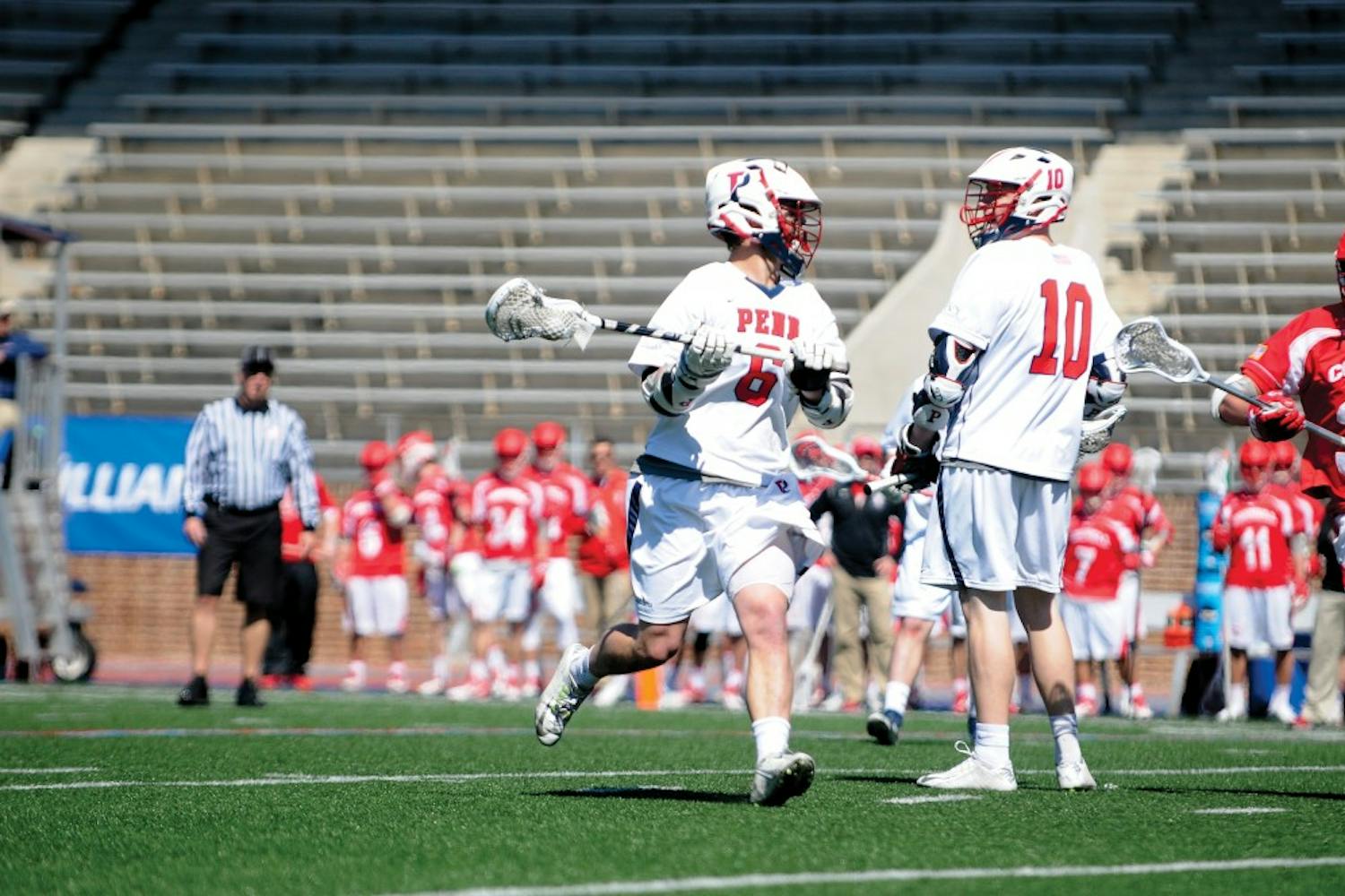 A hat trick from freshman Alex Roesner (6) helped Penn men's lacrosse take a 6-0 lead over Cornell on Sunday as the Quakers held off the Big Red, 9-6.