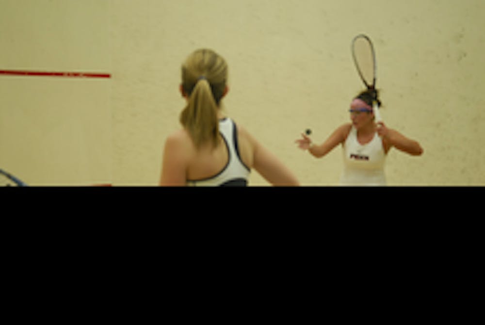 W. Squash wins, but Lange falls